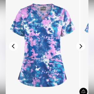 Scrub top size 2X. Soft stretch material in good condition.